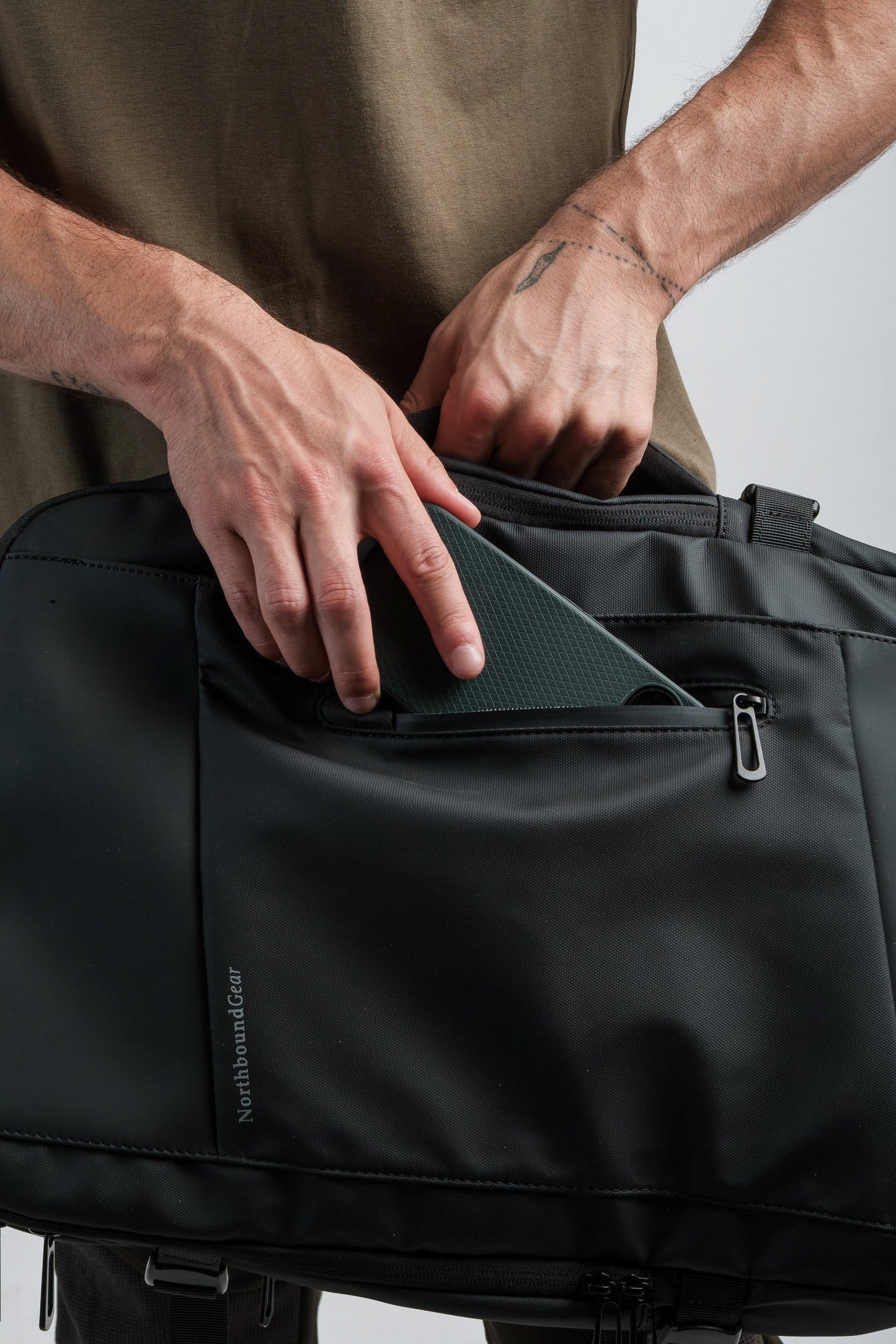 Voyager Expandable Backpack 26L / 38L with Built-in Rain Coat